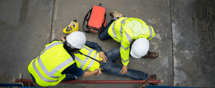 Construction worker being consoled after a construction site accident
